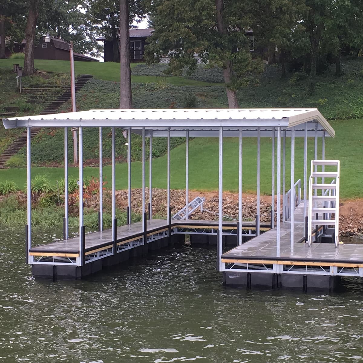 Single covered slip dock house at American lake home